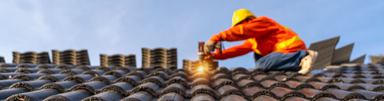 roofer installing a new roof